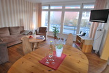 Ferienwohnung in Kellenhusen - Haus Sommerland EG 1 - Wohnzimmer mit Balkon