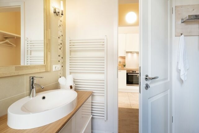 Ferienwohnung in Fehmarn OT Fehmarnsund - Strandresidenz Vogelflug Sundblick - Bild 24