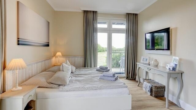 Ferienwohnung in Fehmarn OT Fehmarnsund - Strandresidenz Vogelflug Meerblick Fehmarnsund - Bild 4